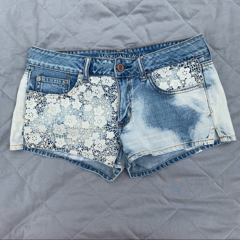 American Eagle denim shorts with white lace detailing